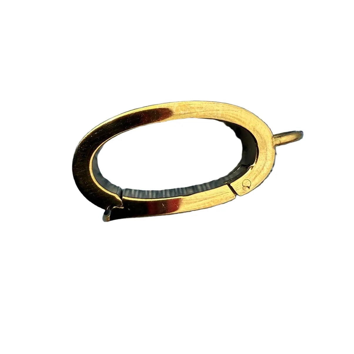 Gold and black oval-shaped object on a white background